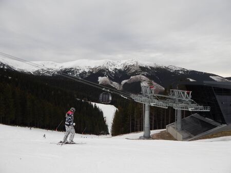 JASNA, SLOVAKIA - JANUARY 10, 2014. Ski resort and people.のeditorial素材