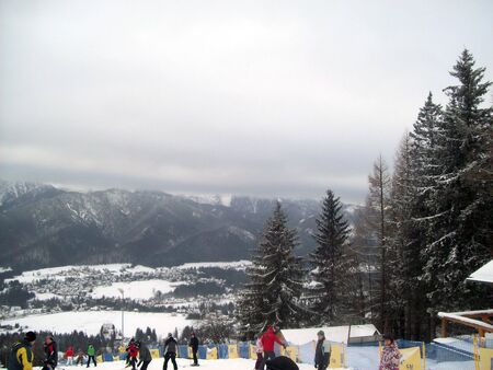 ZAKOPANE, POLAND - JANUARY 7, 2012. Ski resort and people.のeditorial素材