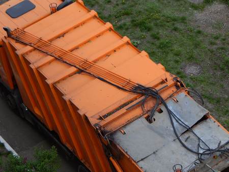 Garbage collection in the city courtyard by carの写真素材