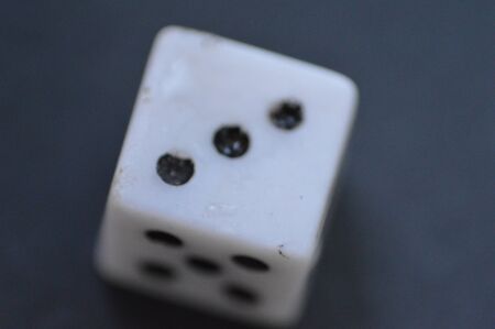 Game dice in the composition of different cubes on background