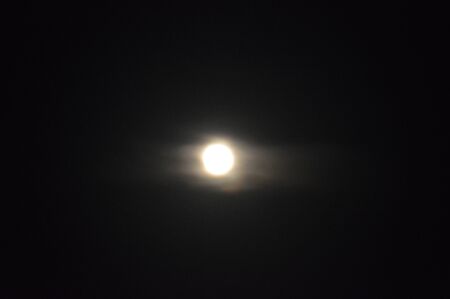 Full moon at night moon close-up on a black the background