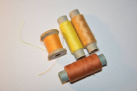 Spools of thread for sewing clothes close-up