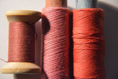 Spools of thread for sewing clothes close-upの写真素材