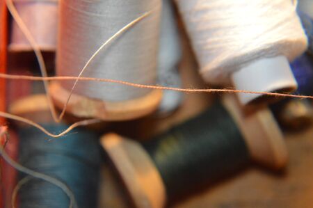 Spools of thread for sewing clothes close-up