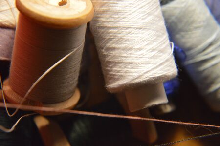 Spools of thread for sewing clothes close-up