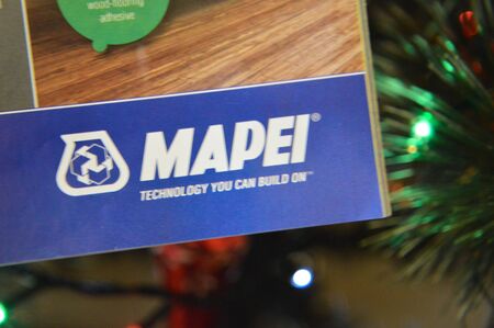 KIEV, UKRAINE - DECEMBER 31, 2019: Logos of brands and trademarks on the background of the Christmas treeのeditorial素材