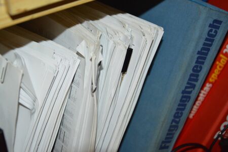 KIEV, UKRAINE - JANUARY 5, 2020: Different books on a shelf the standのeditorial素材