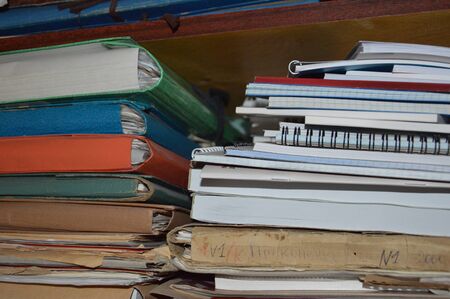 KIEV, UKRAINE - JANUARY 5, 2020: Different books on a shelf the standのeditorial素材
