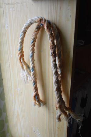 Scraps of a ship's rope hang on furniture
