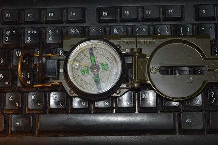 Various objects on the background of a computer the keyboardの写真素材