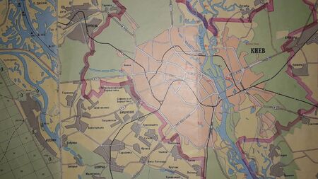 KIEV, UKRAINE - JANUARY 14, 2020: Old collection of maps and the atlases