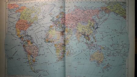 KIEV, UKRAINE - JANUARY 14, 2020: Old collection of maps and the atlases