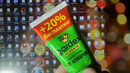 KIEV, UKRAINE - JANUARY 15, 2020: Product with brand Gardex logo on the background of the monitor iconsのeditorial素材