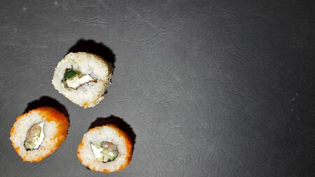 Different sushi sets from a Japanese restaurant on  backgroundの写真素材