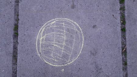Children drawings with chalk on in the pavement