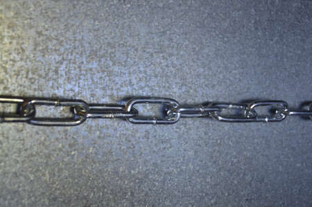 Light metal chain on a different the background