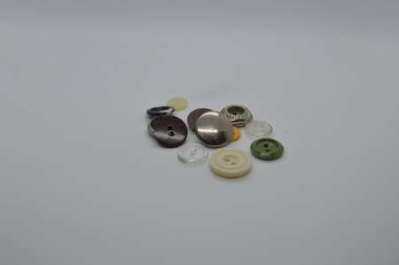 Threads and spools for sewing clothes on a white the background