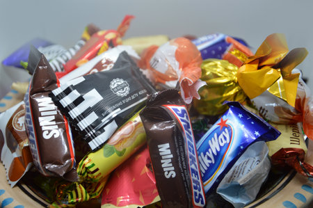 KIEV, UKRAINE - DECEMBER 17, 2020: Candy from an unpacked present for new year and the christmasのeditorial素材