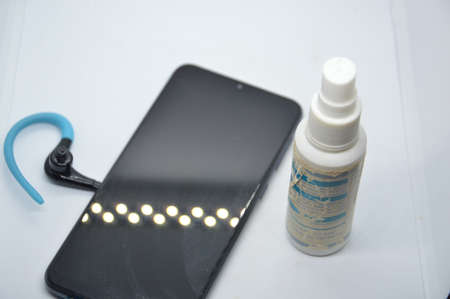 KIEV, UKRAINE - FEBRUARY 2, 2021: Microfiber cleaning with spray liquid the crystal panelsのeditorial素材