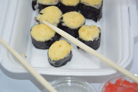 Lie sushi in a white the boxの写真素材