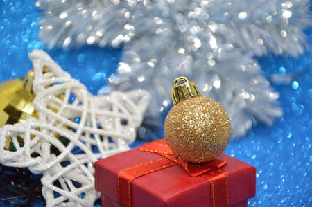 Composition of new year and christmas toys on a the background of the holidayの写真素材