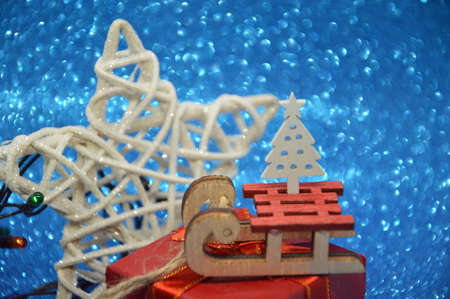 Composition of new year and christmas toys on a the background of the holiday