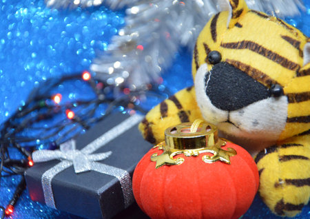 Composition of new year and christmas toys on a the background of the holidayの写真素材