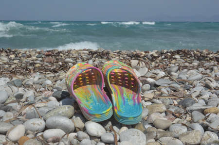 Coral slippers for swimming in a the Aegean Seaの写真素材