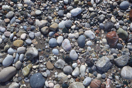 Pebble texture on a the Aegean coast in Greece