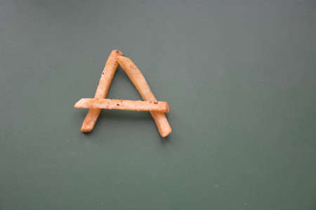 Letters of the english alphabet laid out from french the friesの写真素材