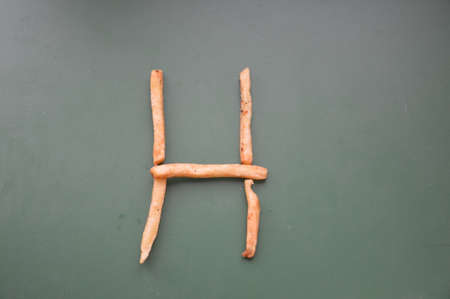 Letters of the english alphabet laid out from french the friesの写真素材