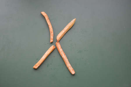 Letters of the english alphabet laid out from french the fries