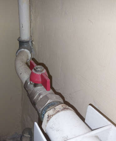 Installed metal heating radiators in the living room in the apartment
