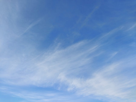 Blue sky with streaks of the cloudsの写真素材