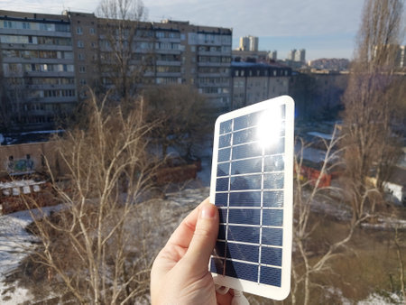 Solar battery to charge smartphone and the power bankの写真素材