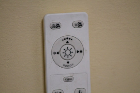 KYIV, UKRAINE - January 13, 2024: Remote controls on in the wall