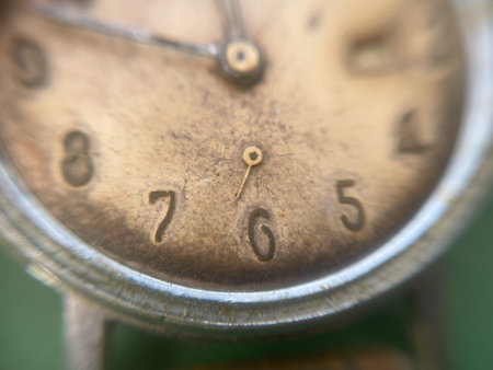 A collection of retro clock dials featuring intricate designs and classic numerals.