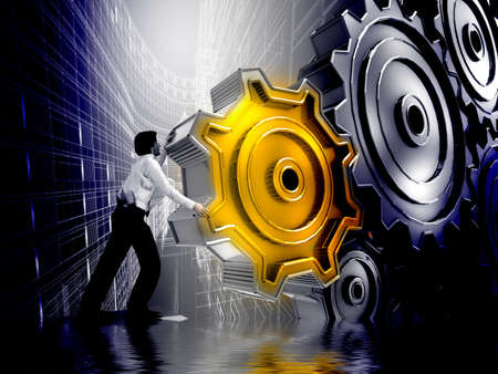 Businessman Turning a Gear の写真素材