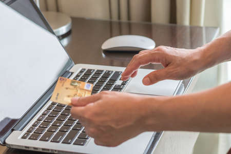 Internet e-payment banking service with consumer buyer using credit card paying purchase for online shopping business via intelligent digital communicationの写真素材