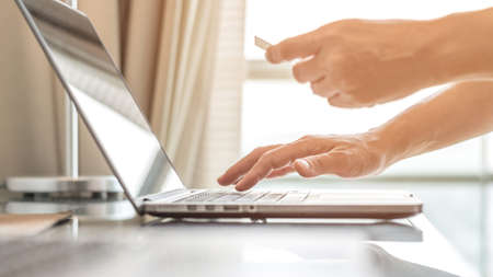 Consumer buyer using credit card paying shopping online bill payment via internet banking serviceの写真素材