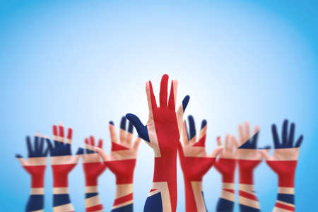 United kingdom (UK) flag pattern on person human people hands.の写真素材