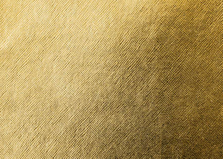 Gold texture background metallic golden foil or shinny wrapping paper bright yellow wall paper for...