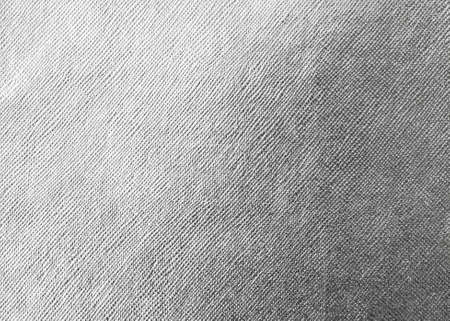 Silver background metallic texture wrapping foil paper shiny white grey metal backdrop for wall paper decoration elementの写真素材