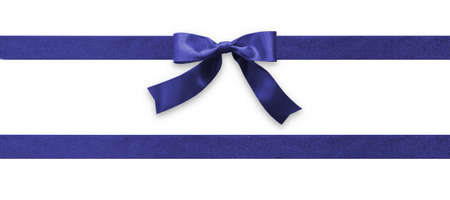 Dark blue bow ribbon band satin navy stripe fabric (isolated on white background with clipping path) for Christmas holiday gift box, greeting card banner, present wrap design decoration ornamentの写真素材