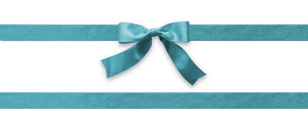 Teal bow ribbon band satin blue stripe fabric (isolated on white background with clipping path) for holiday gift box, wedding greeting card banner, present wrap design decoration ornamentの写真素材