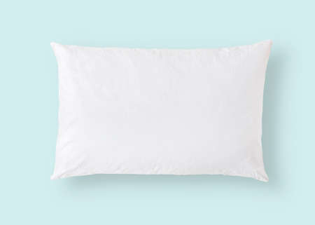 White pillow on blue background isolated  for bedding mockup design templateの写真素材