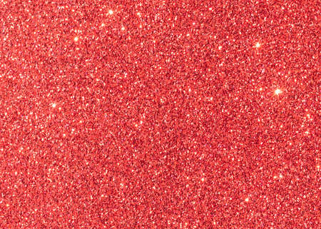 Red glitter texture background for Christmas holiday decoration metallic wallpaper backdrop design...