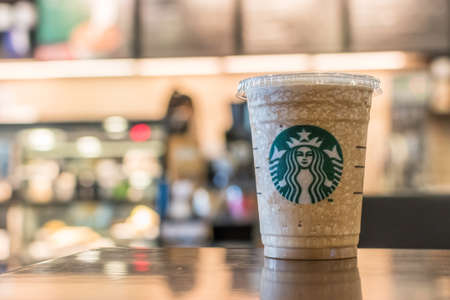 BANGKOK, THAILAND - January 24, 2018: Starbucks coffee cold beverage, coffee brand originated in USA celebrate 20th year anniversary establishment in Thailandのeditorial素材