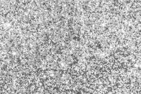 Silver glitter texture white sparkling shiny wrapping paper background for Christmas holiday seasonal wallpaper decoration, greeting and wedding invitation card design elementの写真素材