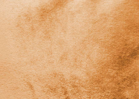 Copper gold velvet background or golden yellow velour flannel texture made of cotton or wool with...
